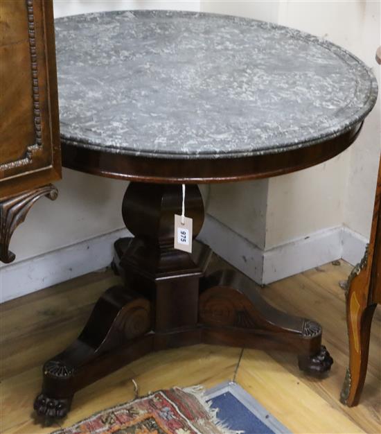 A French Empire mahogany centre table, with circular grey marble top, on hexagonal baluster stem and tripod base with lions paw feet, D